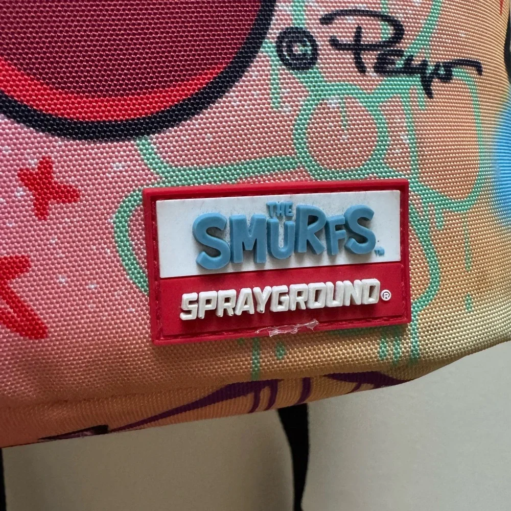 Sprayground x The Smurfs Papa Smurf On The Run Backpack